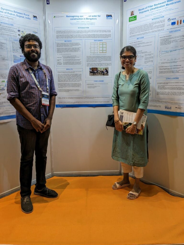 Researchers Shashank Palur and Sneha Singh showcase their poster on using treated wastewater for construction at the 13th IWA (International Water Association) conference in Chennai in January 2023.