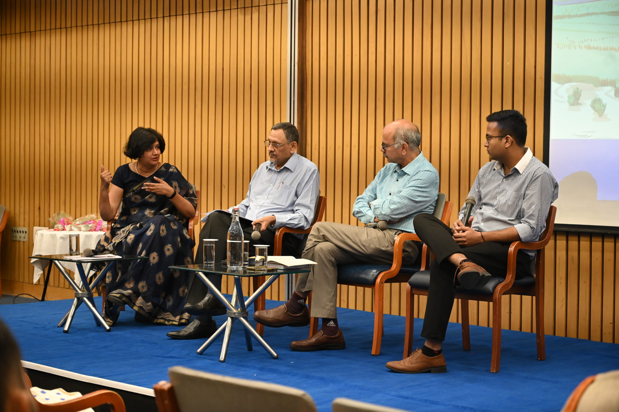 Seated on a dais, from left: Dr Veena Srinivasan, Executive Director, WELL Labs, speaks with Dr Alok Sikka, Dr Shambu Prasad and Mr Amandeep Panwar at India International Centre on July 26.