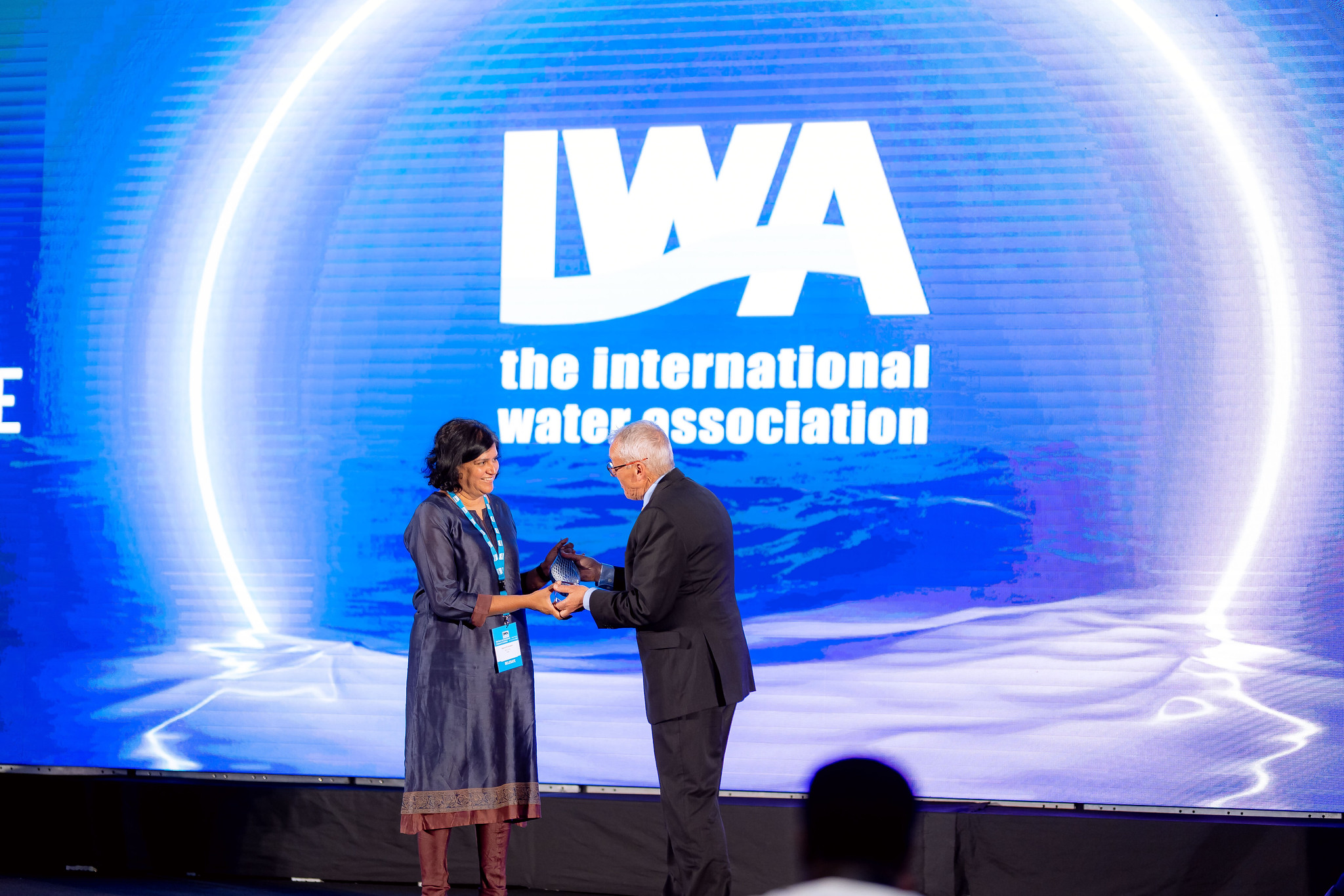 Founder and Executive Director of Bengaluru-based WELL Labs, Dr Veena Srinivasan, receives the International Water Association’s Water and Development Award for Research from Tom Mollenkopf, IWA President and Board Member, at Kigali, Rwanda on Sunday. Credit: IWA