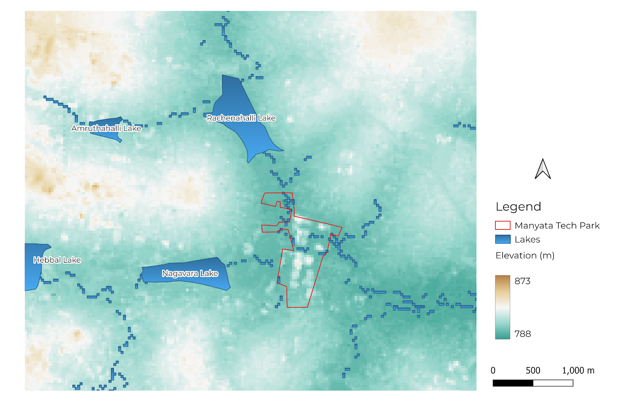 Visual from QGIS showing Manyata Tech Park (outlined in red). The blue dotted lines represent primary drains.