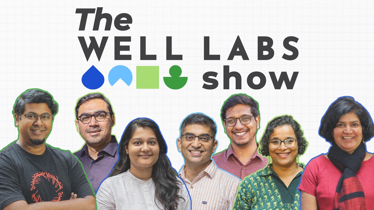 An image of Dr. Rao, with a dam in the background. 